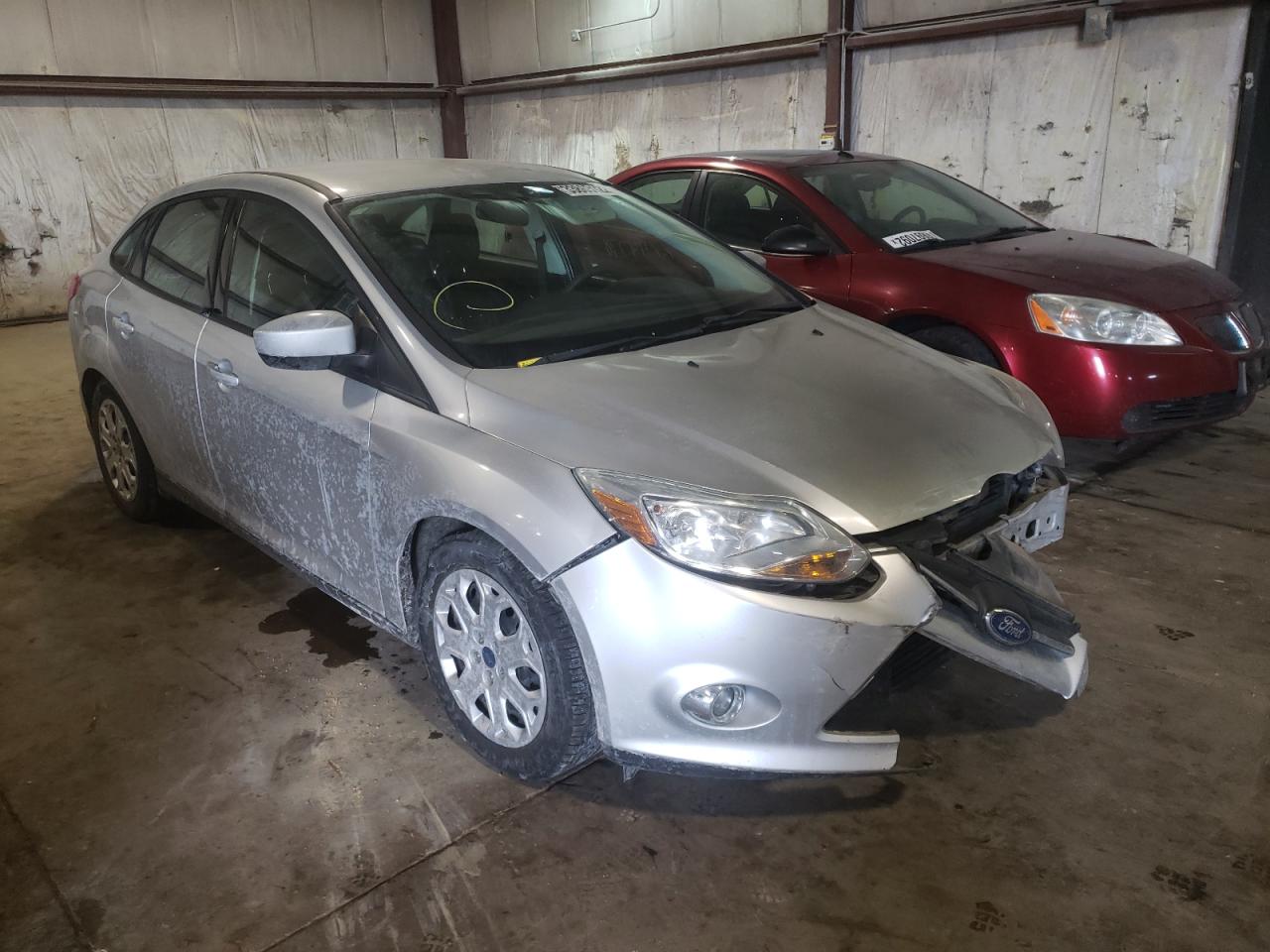FORD FOCUS SE 2012 with VIN 1FAHP3F2XCL163854 - Photo from auction