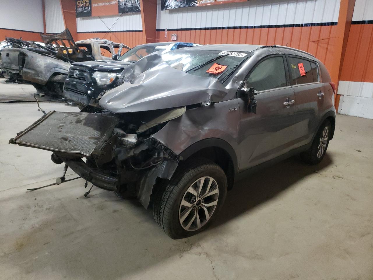 Photo 2 from auction – 2014 KIA SPORTAGE E with VIN KNDPCCAC2E7598929