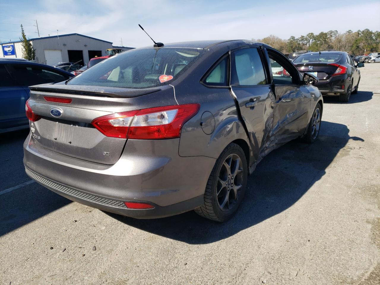 Photo 4 from auction – 2013 FORD FOCUS SE with VIN 1FADP3F24DL205032