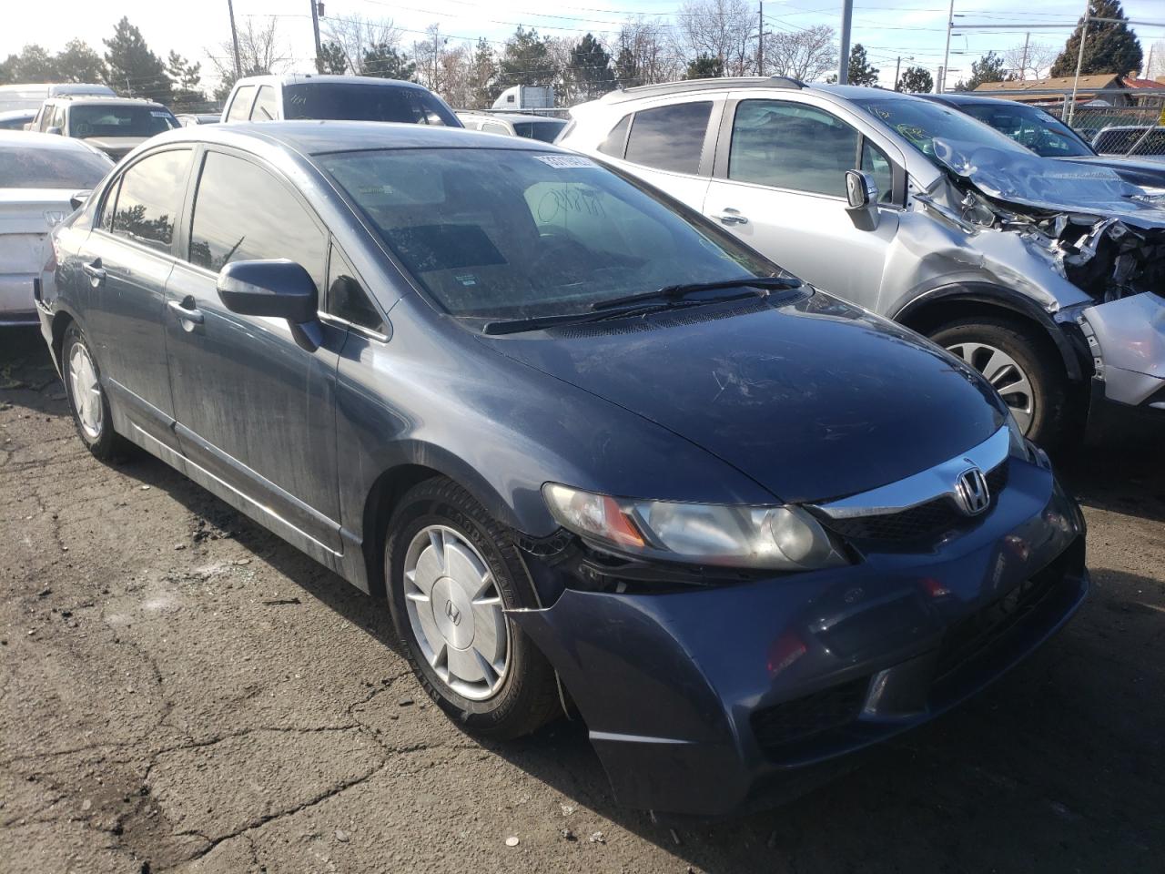 HONDA CIVIC HYBR 2010 with VIN JHMFA3F25AS001246 - Photo from auction