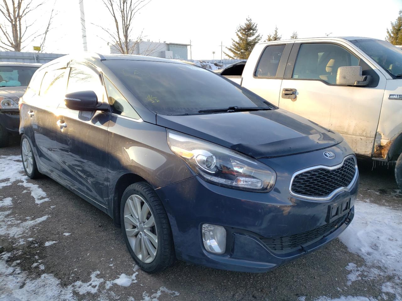 KIA RONDO 2014 with VIN KNAHU8A31E7045684 - Photo from auction