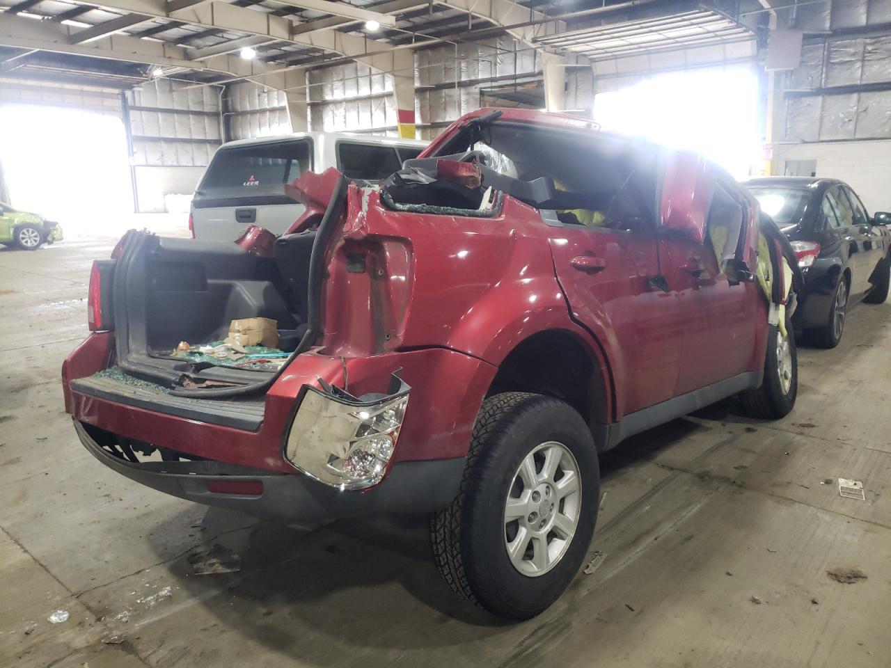 Photo 4 from auction – 2009 MAZDA TRIBUTE I with VIN 4F2CZ92739KM00511