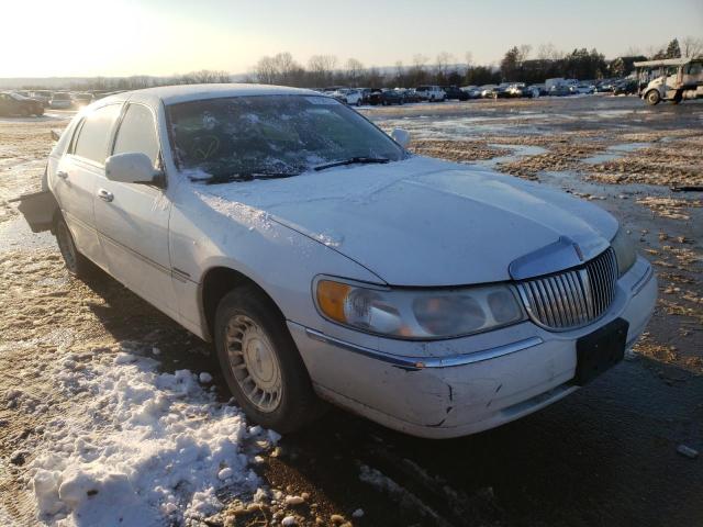 Photo 1 from auction – 1999 LINCOLN TOWN CAR E with VIN 1LNHM81W2XY667863