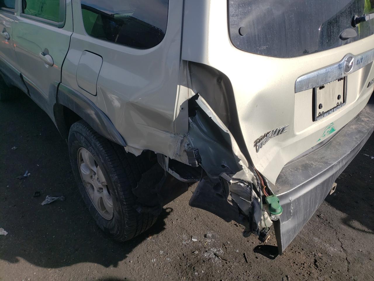 Photo 9 from auction – 2004 MAZDA TRIBUTE LX with VIN 4F2CZ94114KM33878