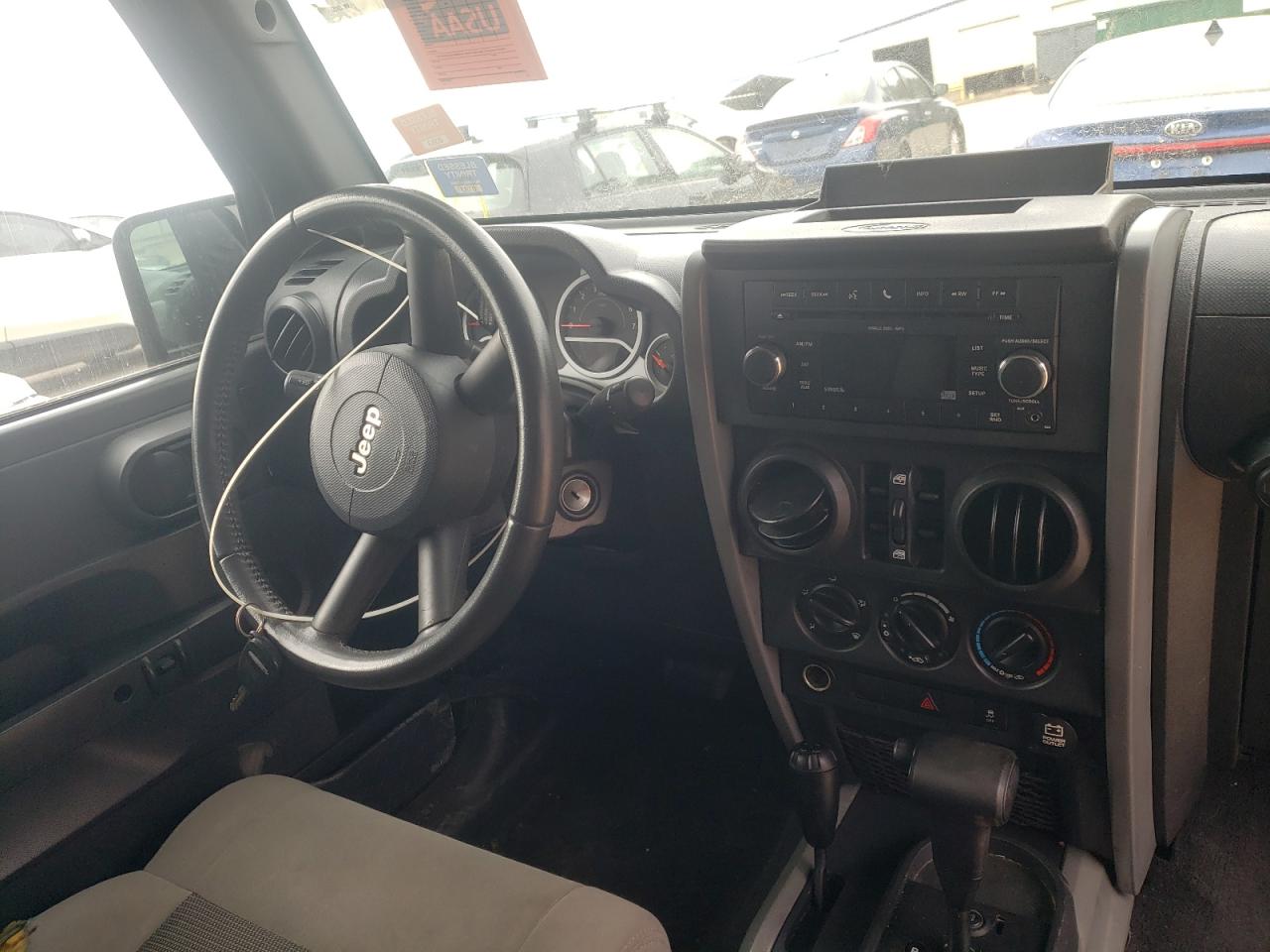 Photo 9 from auction – 2010 JEEP WRANGLER U with VIN 1J4BA3H14AL229117