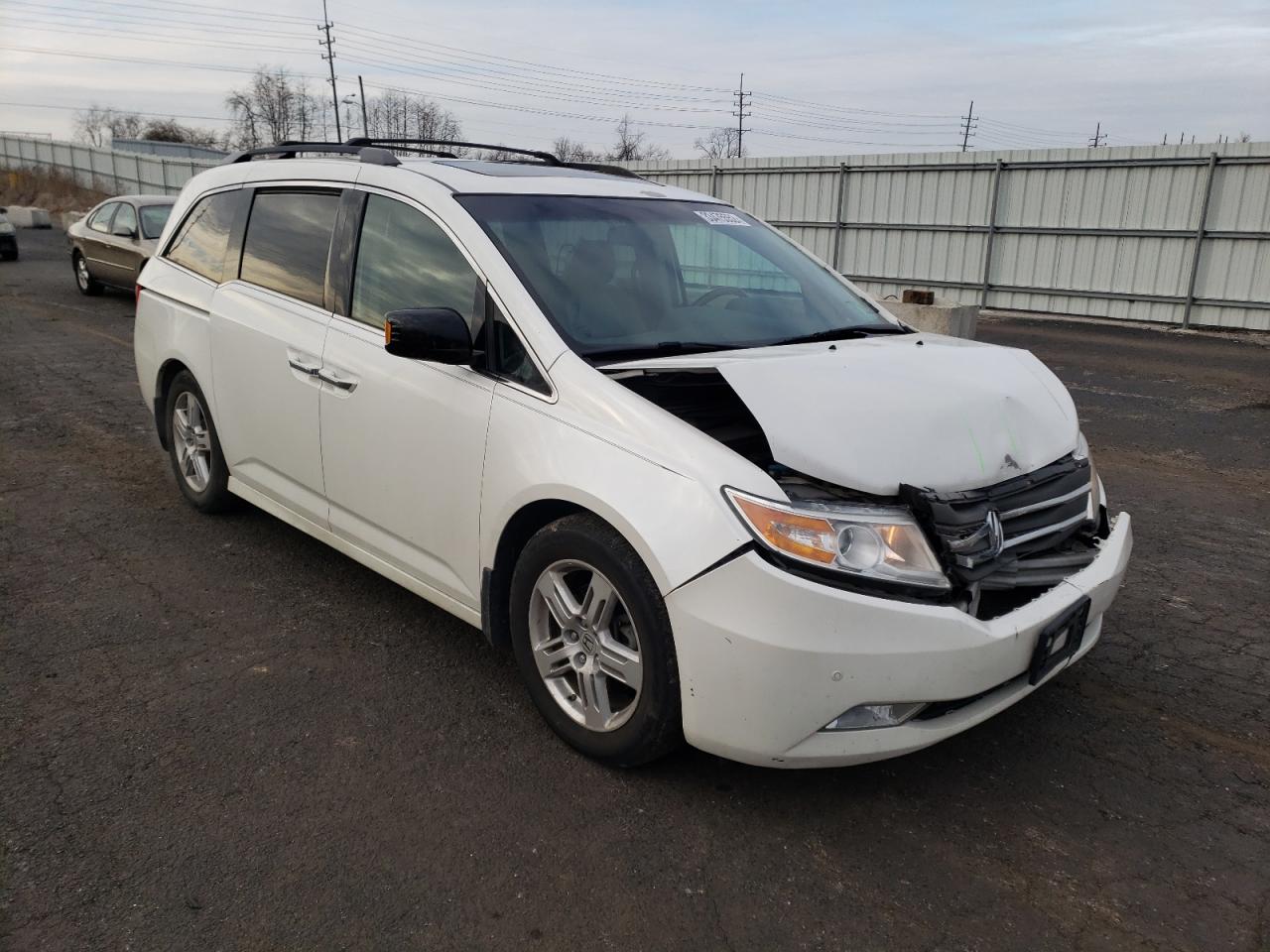 HONDA ODYSSEY TO 2012 with VIN 5FNRL5H93CB119486 - Photo from auction