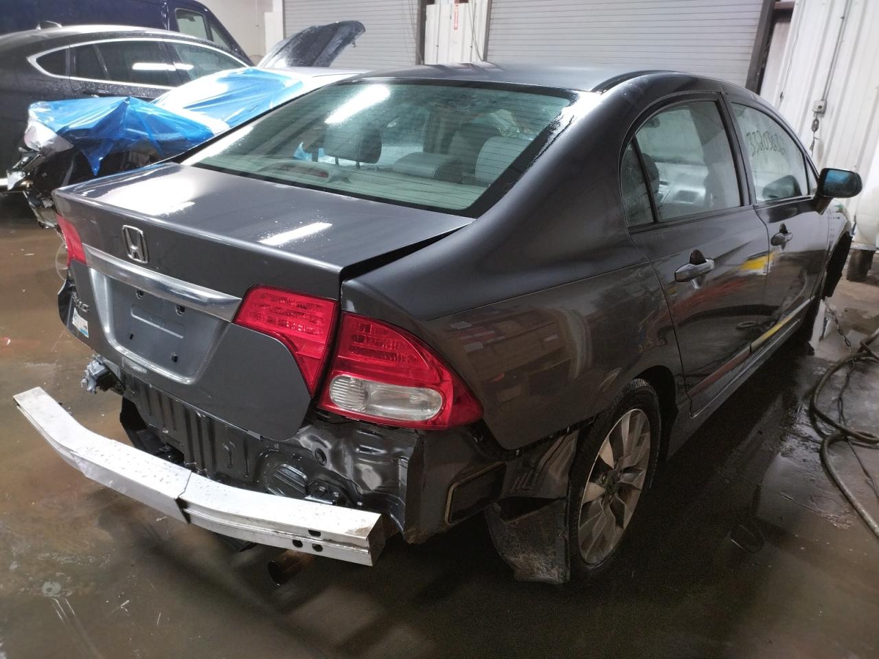 Photo 4 from auction – 2010 HONDA CIVIC EXL with VIN 19XFA1F91AE026702