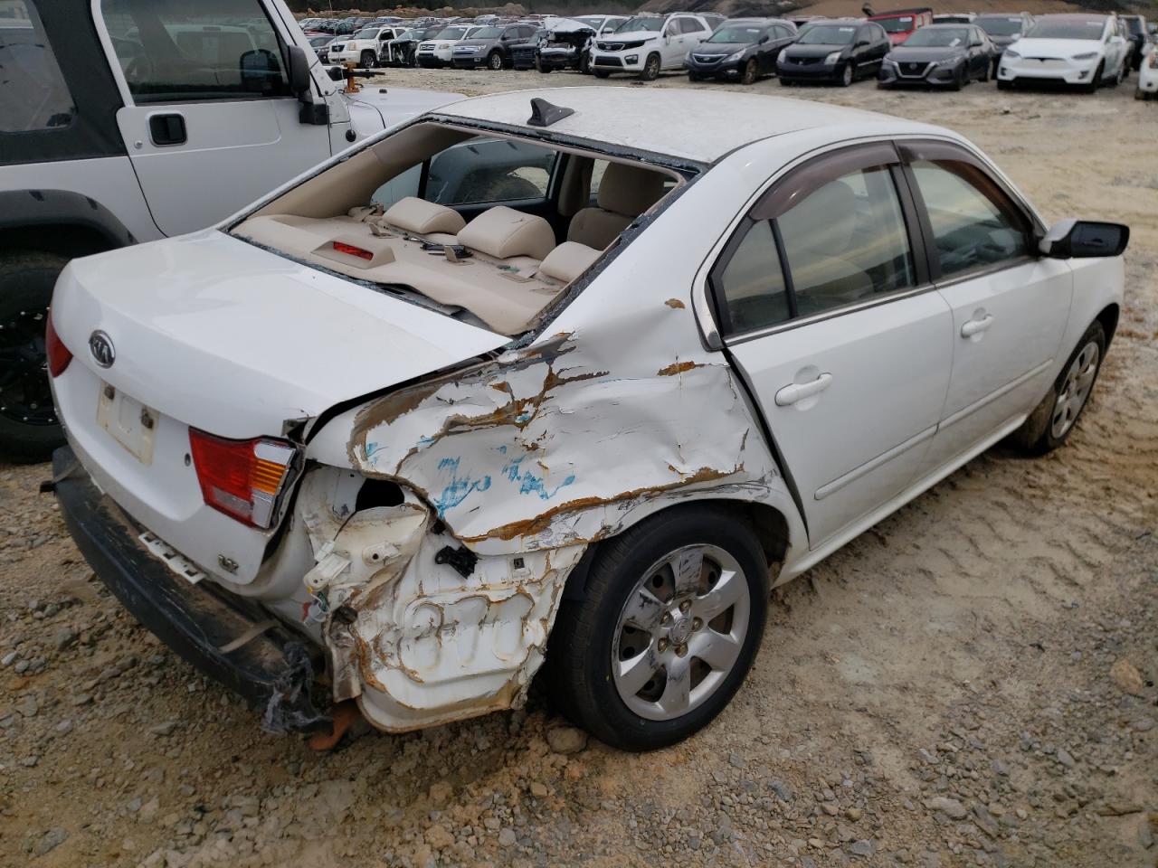 Photo 4 from auction – 2009 KIA OPTIMA LX with VIN KNAGE228095332676