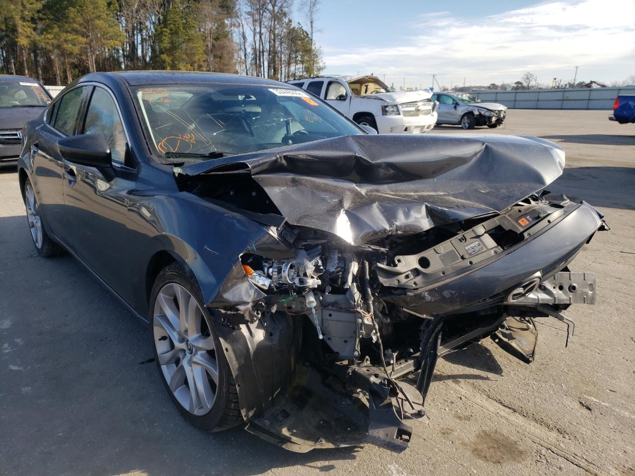 MAZDA 6 TOURING 2014 with VIN JM1GJ1V69E1135395 - Photo from auction