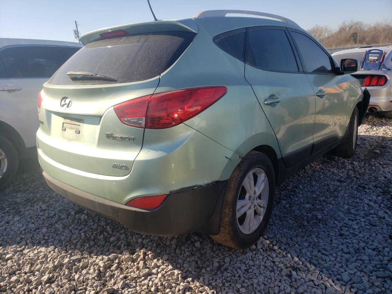 Photo 4 from auction – 2011 HYUNDAI TUCSON GLS with VIN KM8JUCAC6BU309756