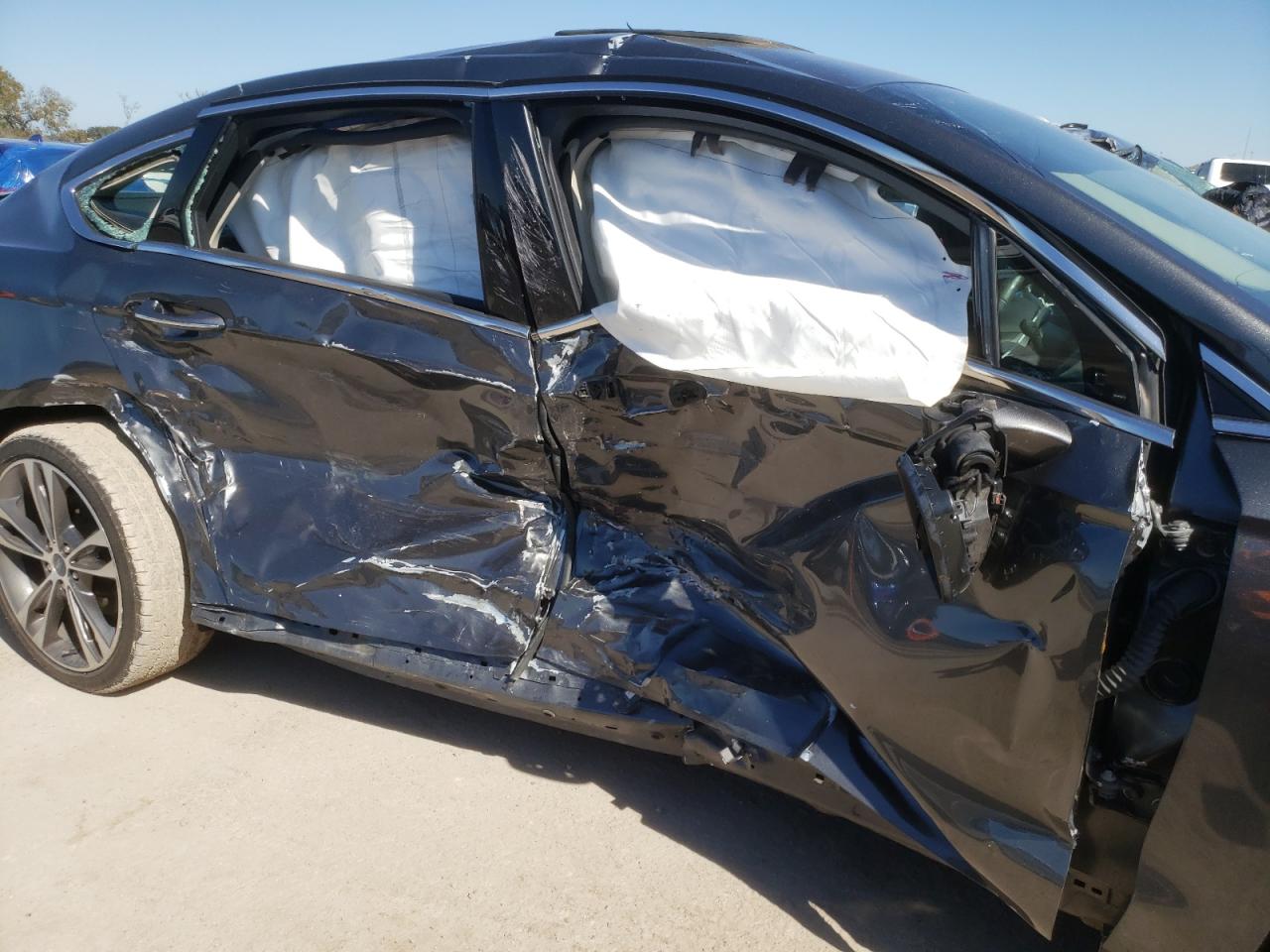 Photo 9 from auction – 2019 FORD FUSION TIT with VIN 3FA6P0D97KR120384