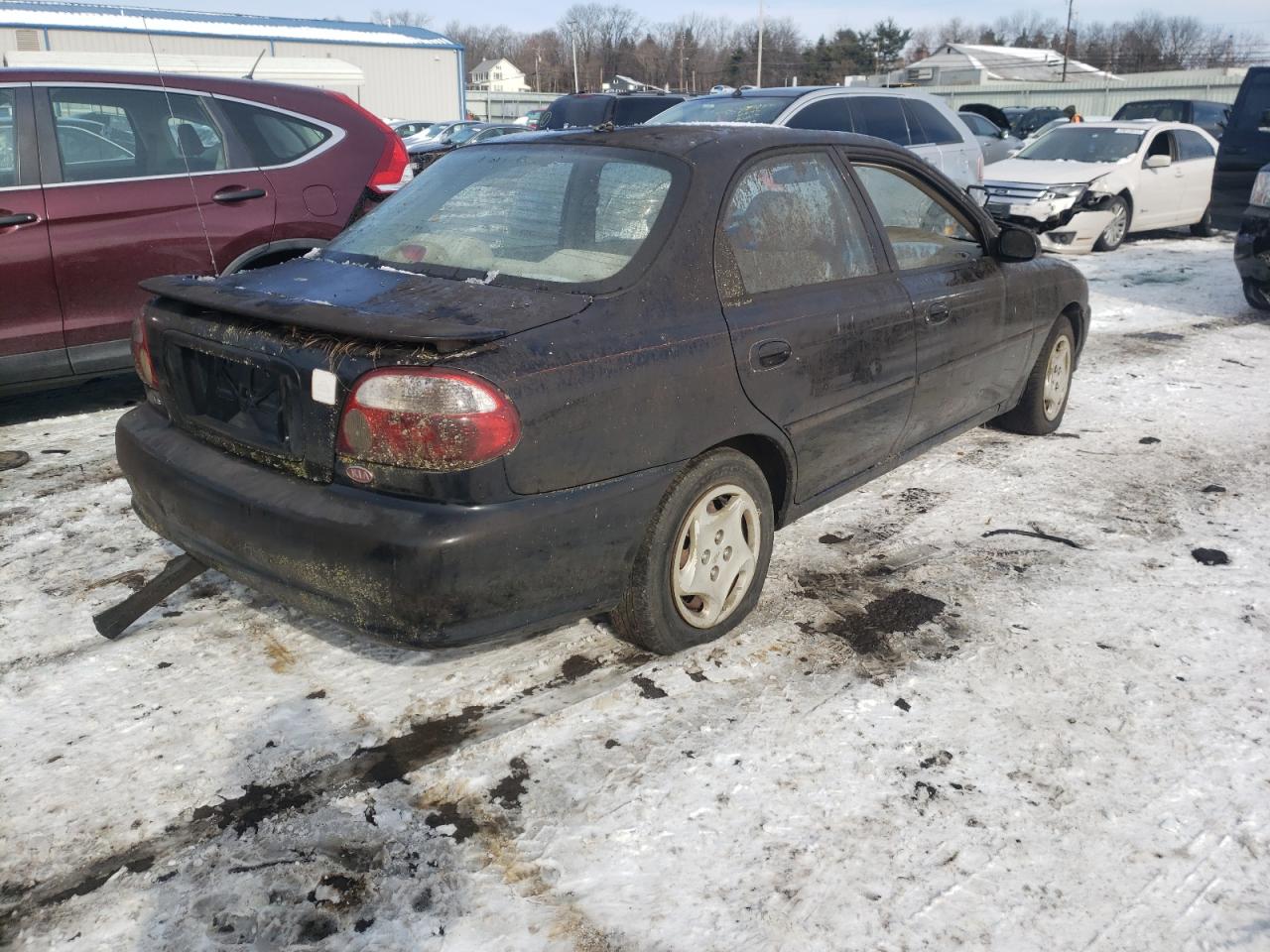 Photo 4 from auction – 2001 KIA SEPHIA BAS with VIN KNAFB121215069774