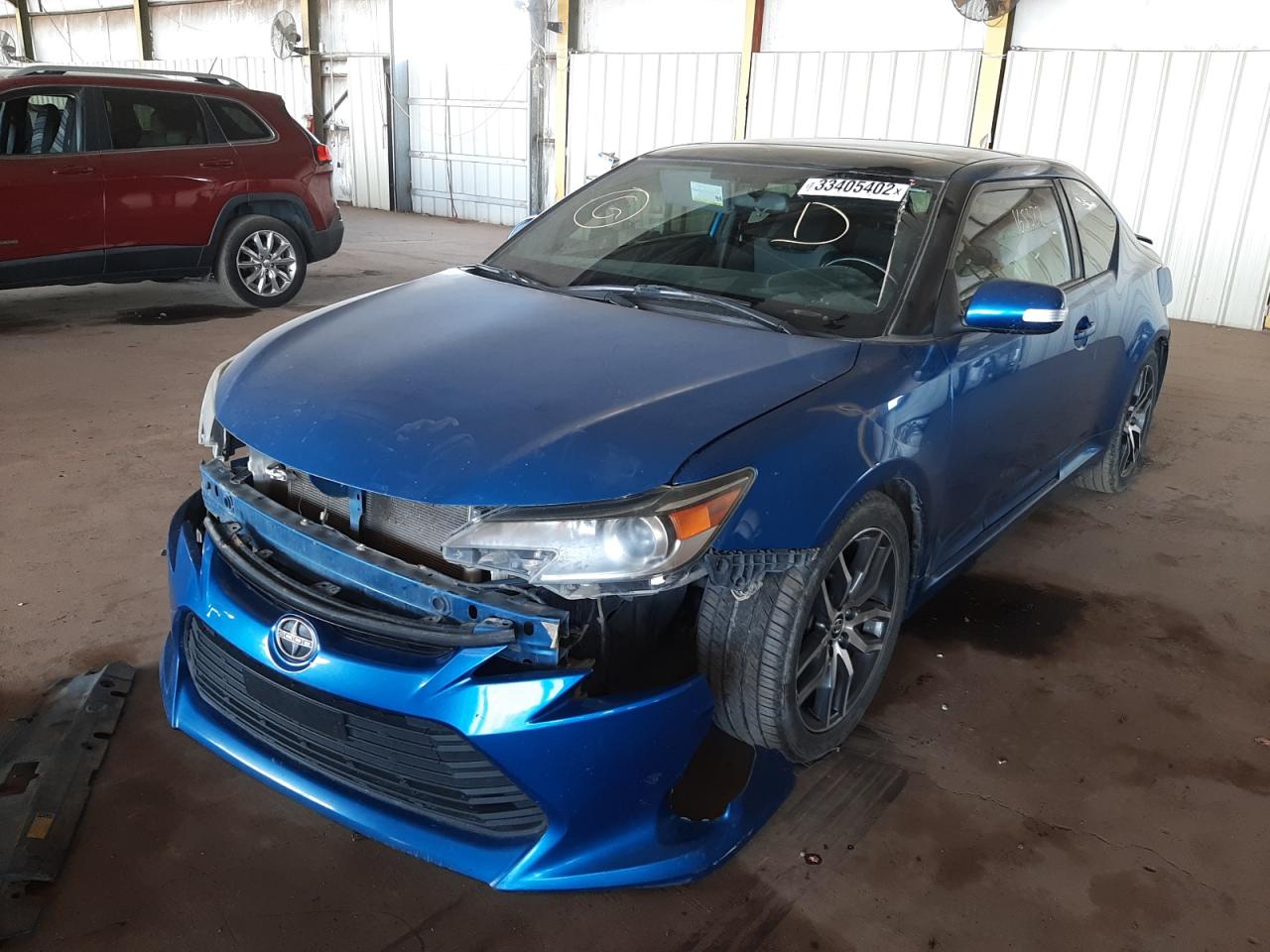 Photo 2 from auction – 2014 TOYOTA SCION TC with VIN JTKJF5C79E3072922