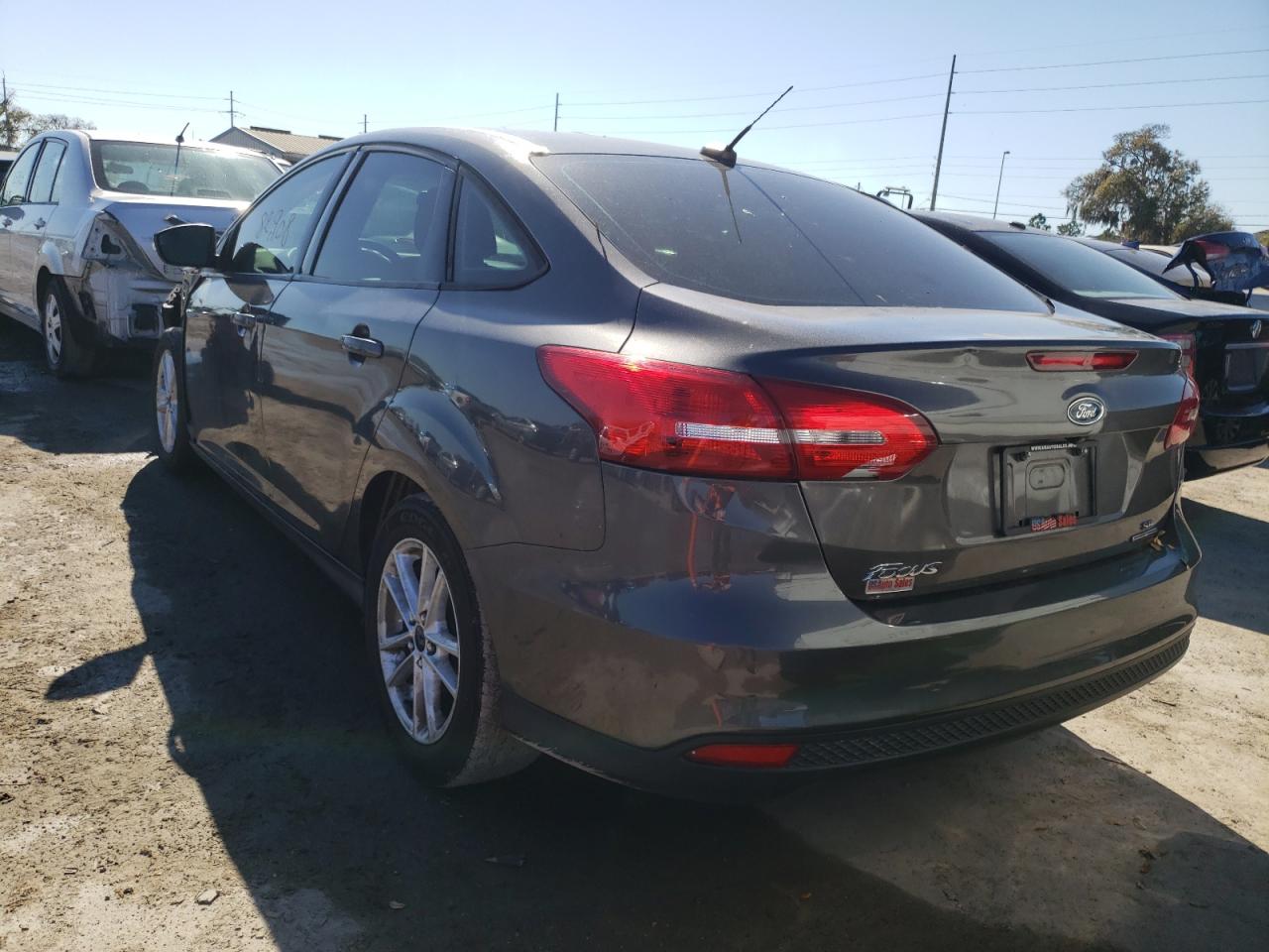 Photo 3 from auction – 2015 FORD FOCUS SE with VIN 1FADP3F29FL242791
