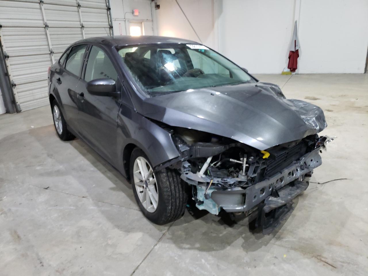 FORD FOCUS SE 2018 with VIN 1FADP3F2XJL237267 - Photo from auction
