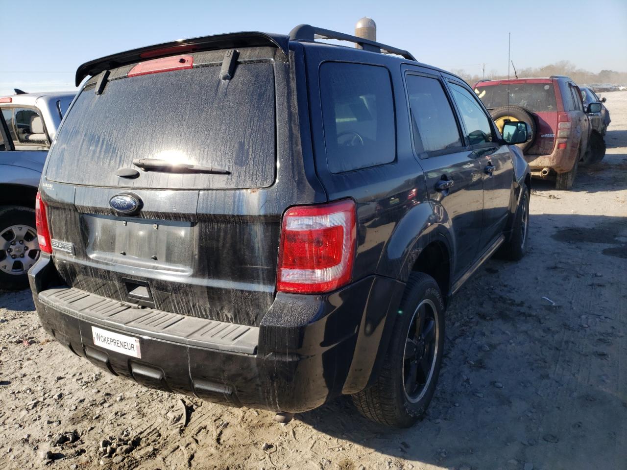 Photo 4 from auction – 2011 FORD ESCAPE with VIN 1FMCU9D75BKA87071