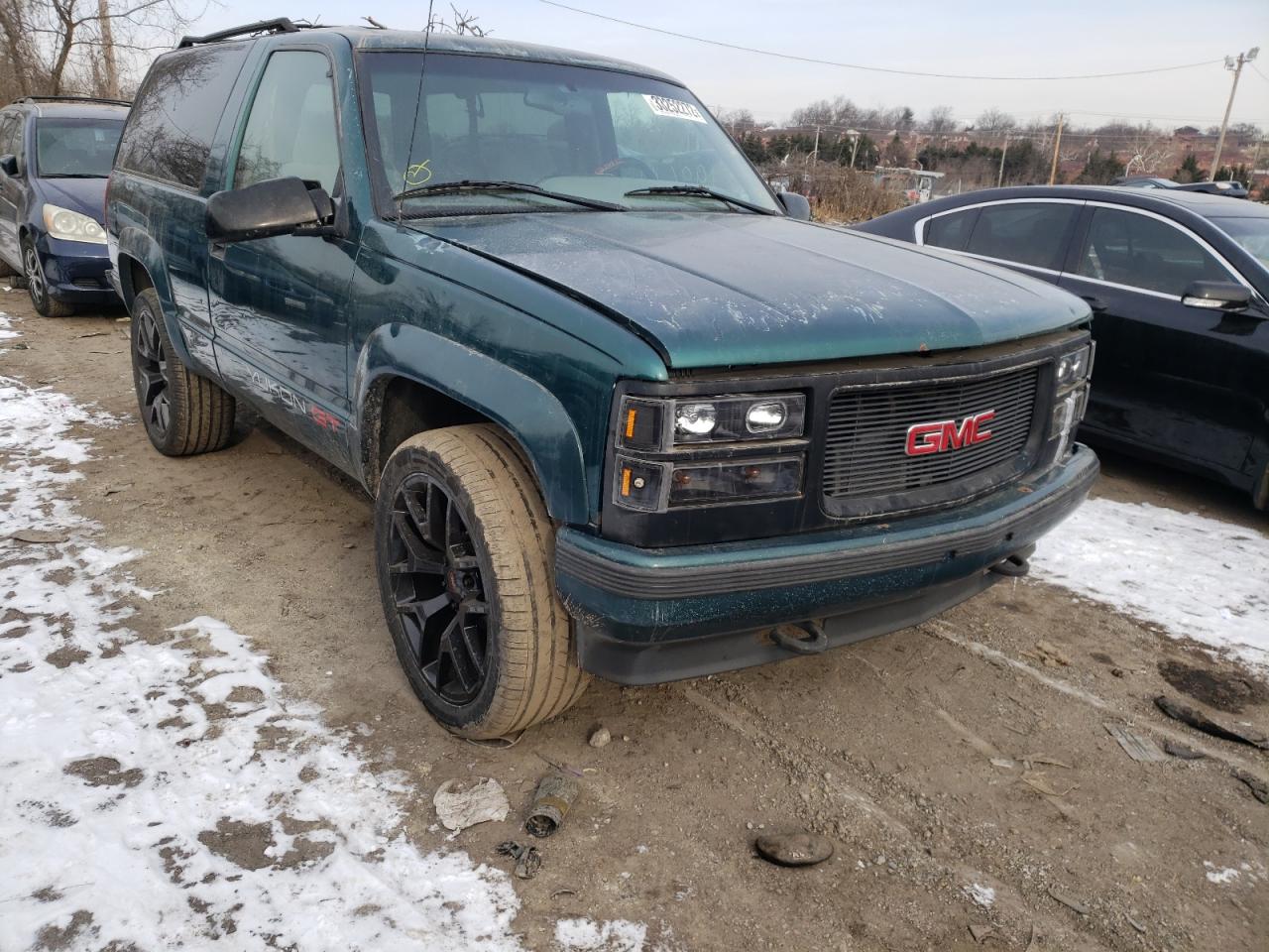 GMC YUKON 1995 with VIN 3GKEK18K3SG506355 - Photo from auction