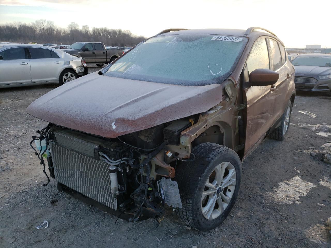 Photo 2 from auction – 2017 FORD ESCAPE SE with VIN 1FMCU9GD4HUE72345