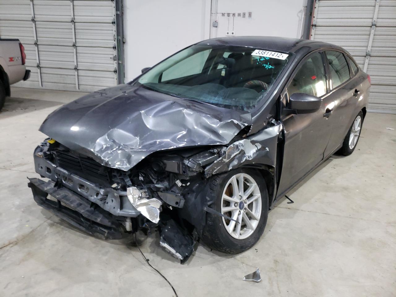 Photo 2 from auction – 2018 FORD FOCUS SE with VIN 1FADP3F2XJL237267