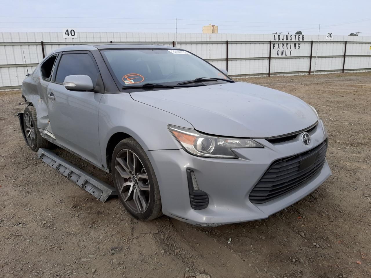 TOYOTA SCION TC 2014 with VIN JTKJF5C79E3077893 - Photo from auction