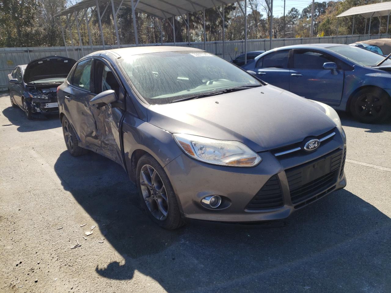 FORD FOCUS SE 2013 with VIN 1FADP3F24DL205032 - Photo from auction
