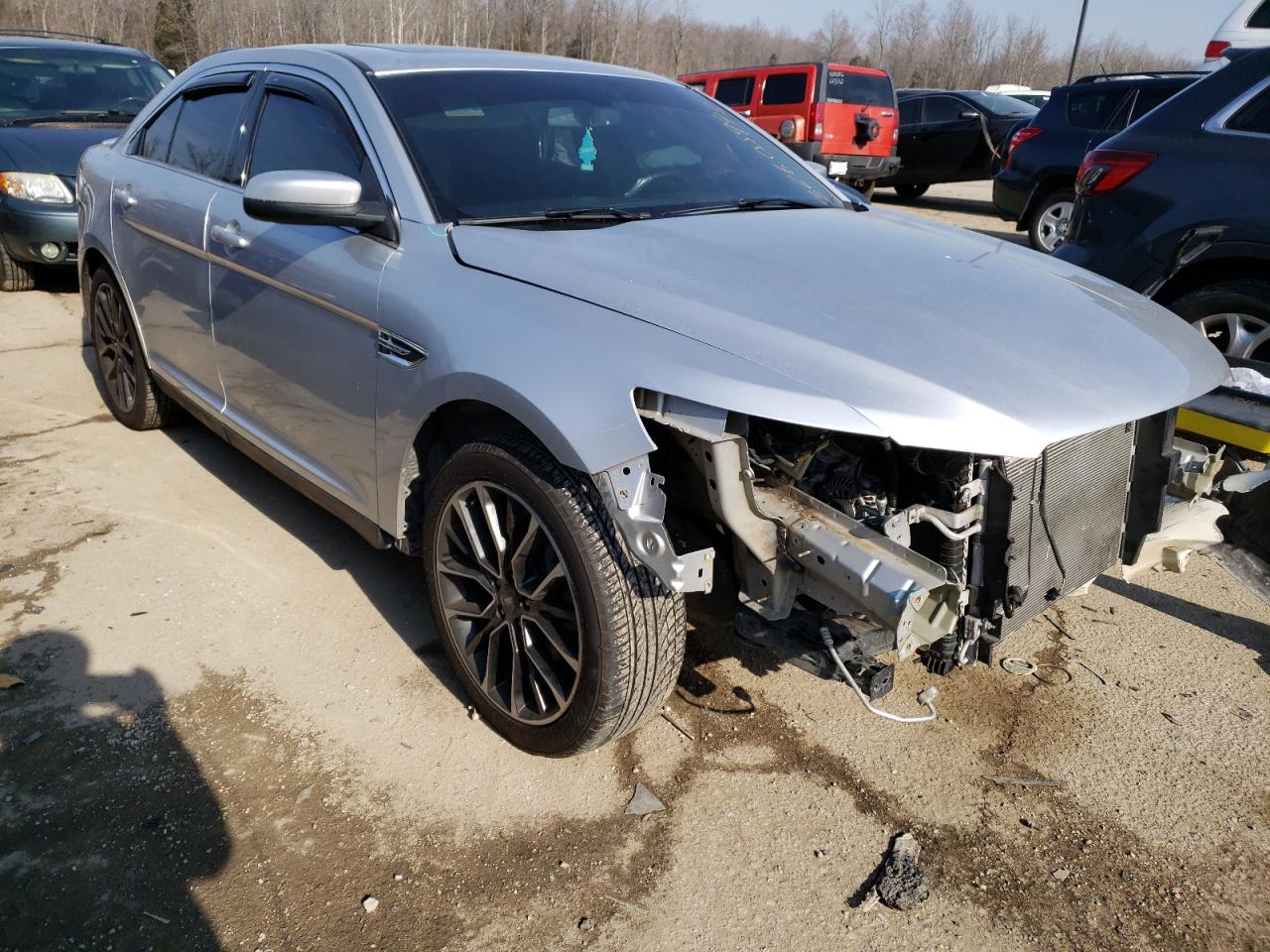 FORD TAURUS SEL 2018 with VIN 1FAHP2E8XJG115471 - Photo from auction