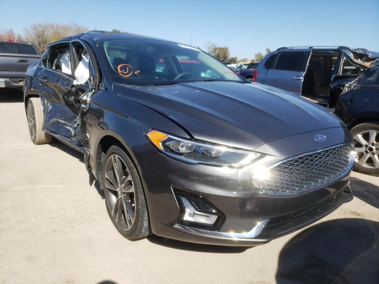 FORD FUSION TIT 2019 with VIN 3FA6P0D97KR120384 - Photo from auction