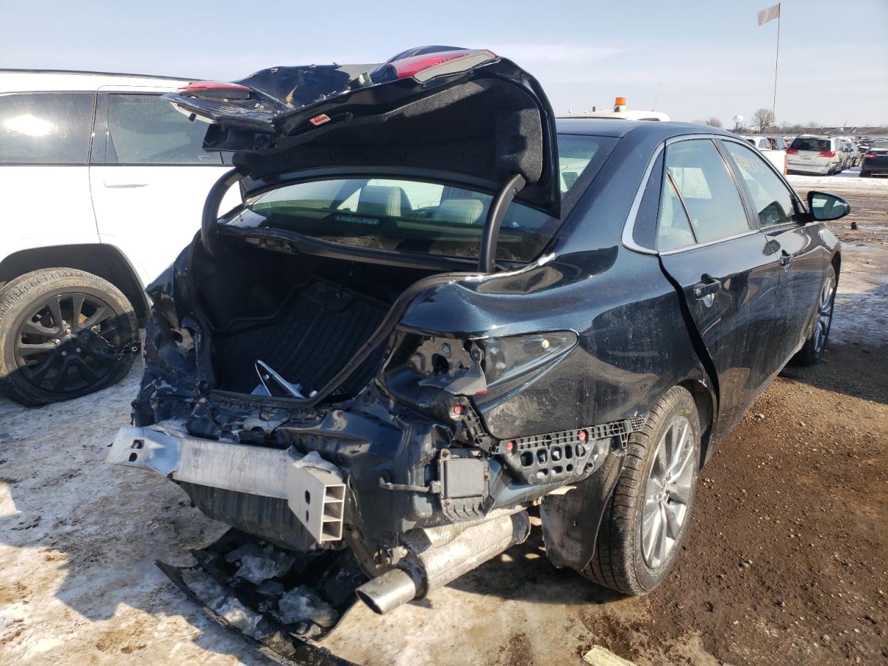 Photo 4 from auction – 2016 TOYOTA CAMRY HYBR with VIN 4T1BD1FK0GU181837
