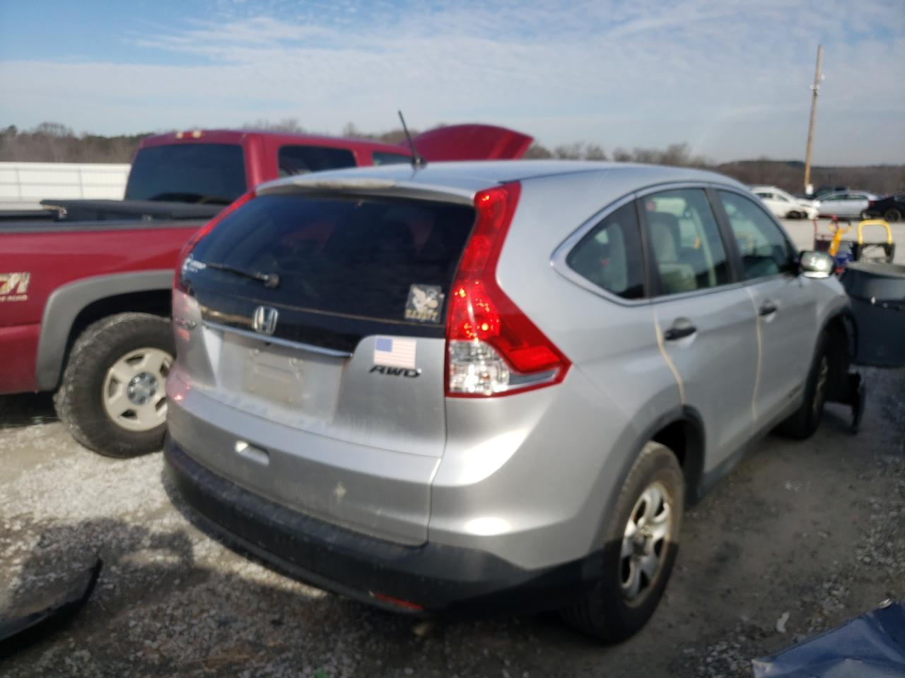 Photo 4 from auction – 2014 HONDA CR-V LX with VIN 2HKRM4H38EH647595
