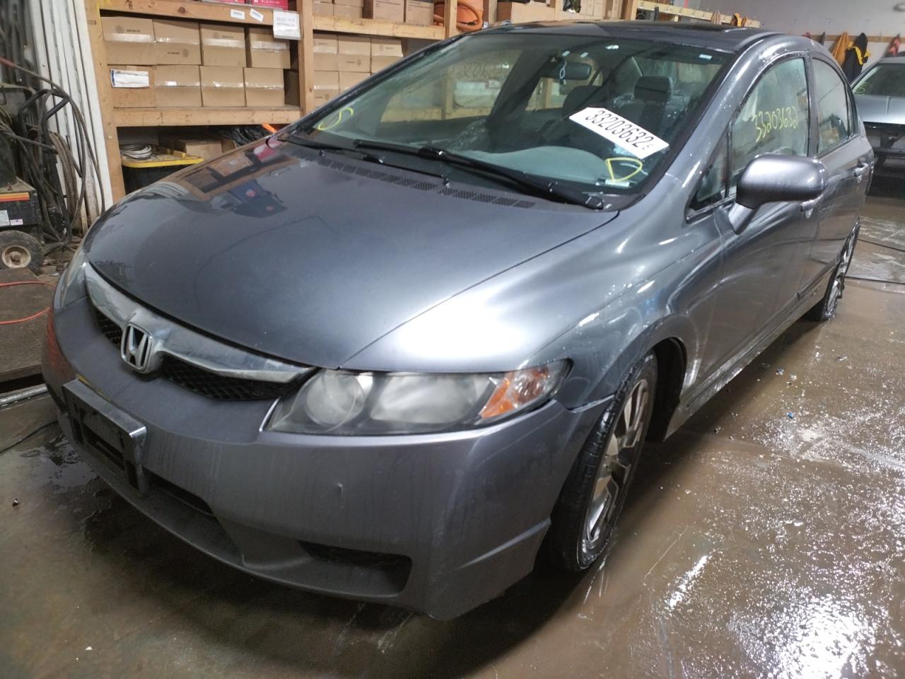 Photo 2 from auction – 2010 HONDA CIVIC EXL with VIN 19XFA1F91AE026702