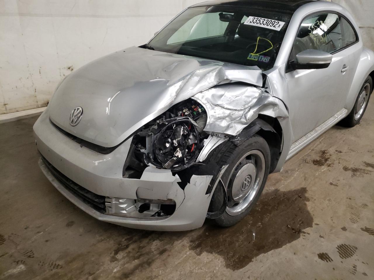 Photo 9 from auction – 2012 VOLKSWAGEN BEETLE with VIN 3VWJP7AT0CM645733