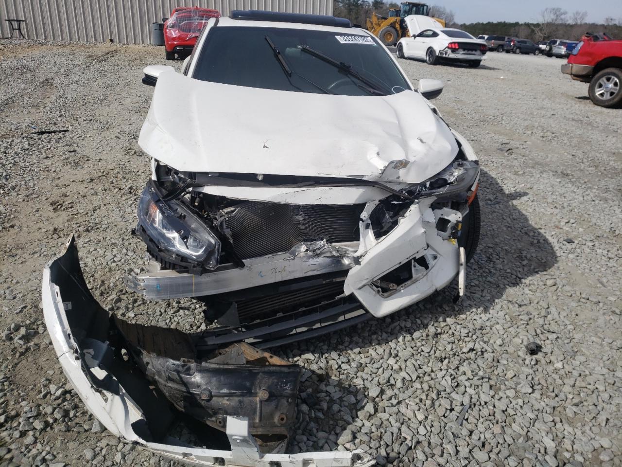 Photo 9 from auction – 2016 HONDA CIVIC EXL with VIN 2HGFC3B7XGH352233