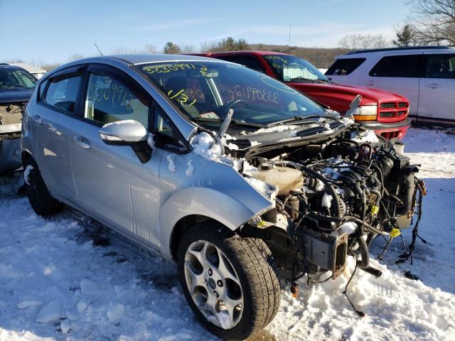 FORD FIESTA SES 2011 with VIN 3FADP4FJ4BM212829 - Photo from auction