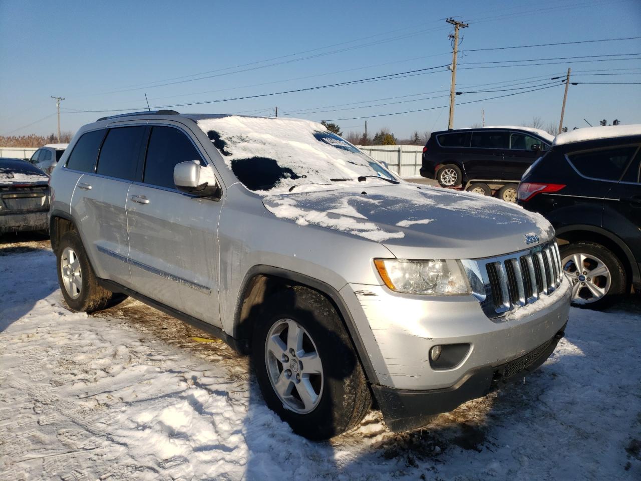 JEEP GRAND CHER 2011 with VIN 1J4RR4GG9BC515145 - Photo from auction