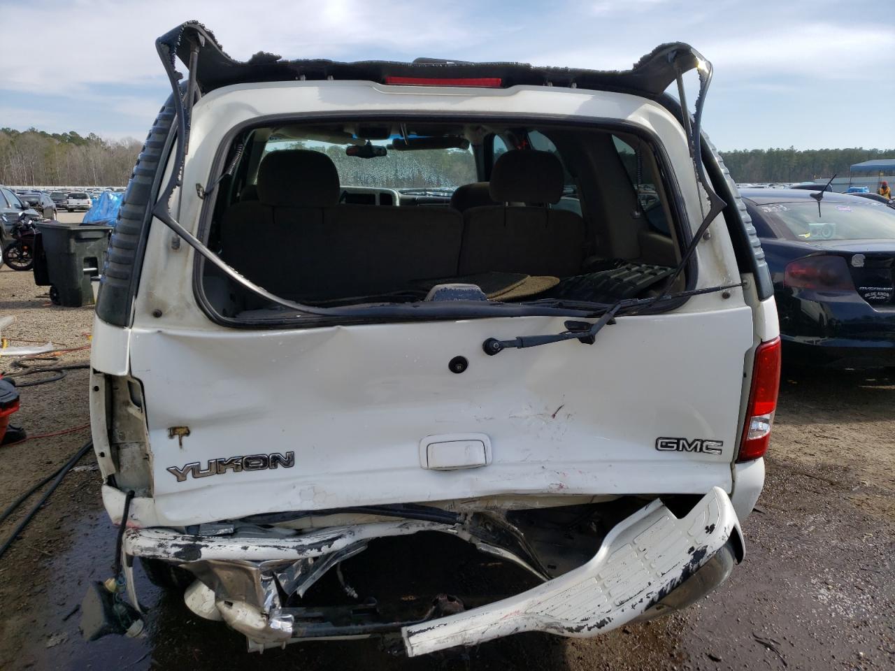 Photo 9 from auction – 2002 GMC YUKON with VIN 1GKEC13Z62J174590