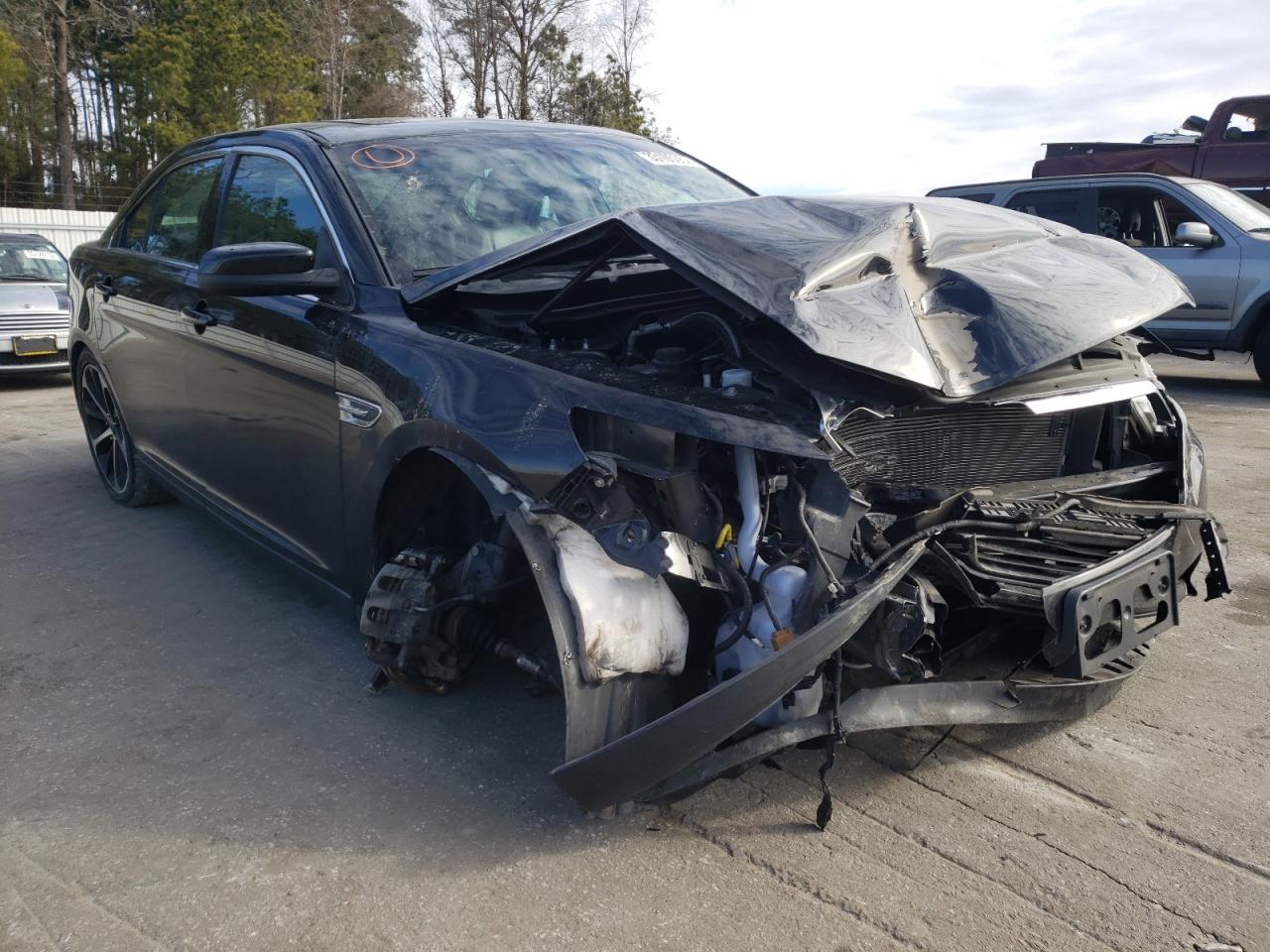 FORD TAURUS SEL 2014 with VIN 1FAHP2E84EG157785 - Photo from auction