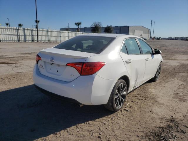 Photo 4 from auction – 2017 TOYOTA COROLLA L with VIN 5YFBURHE6HP636800