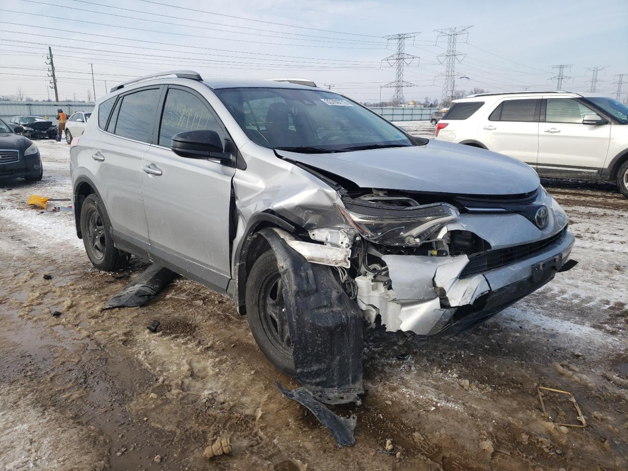 TOYOTA RAV4 LE 2018 with VIN 2T3ZFREV0JW469360 - Photo from auction