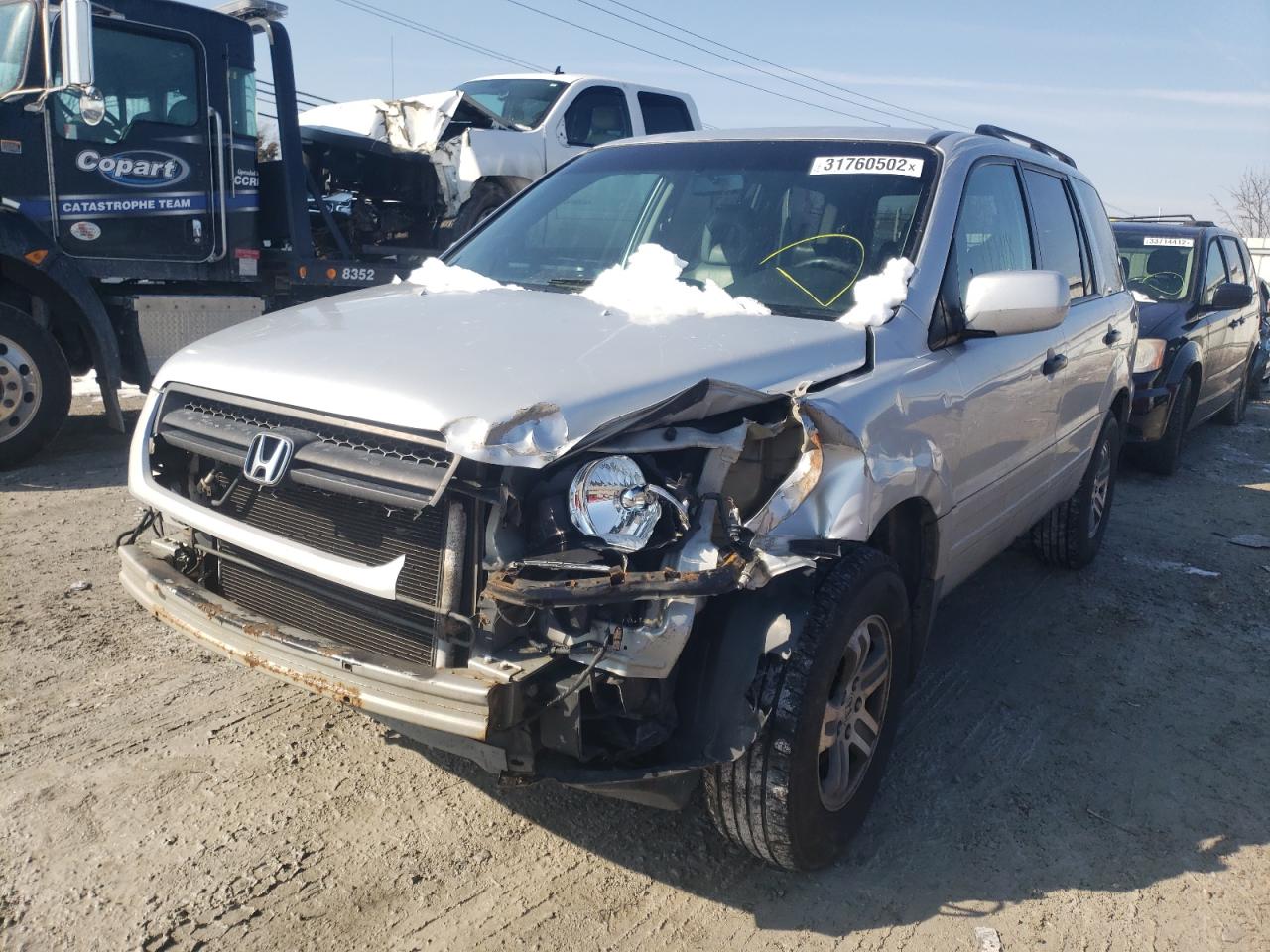 Photo 2 from auction – 2004 HONDA PILOT EXL with VIN 2HKYF18574H571128