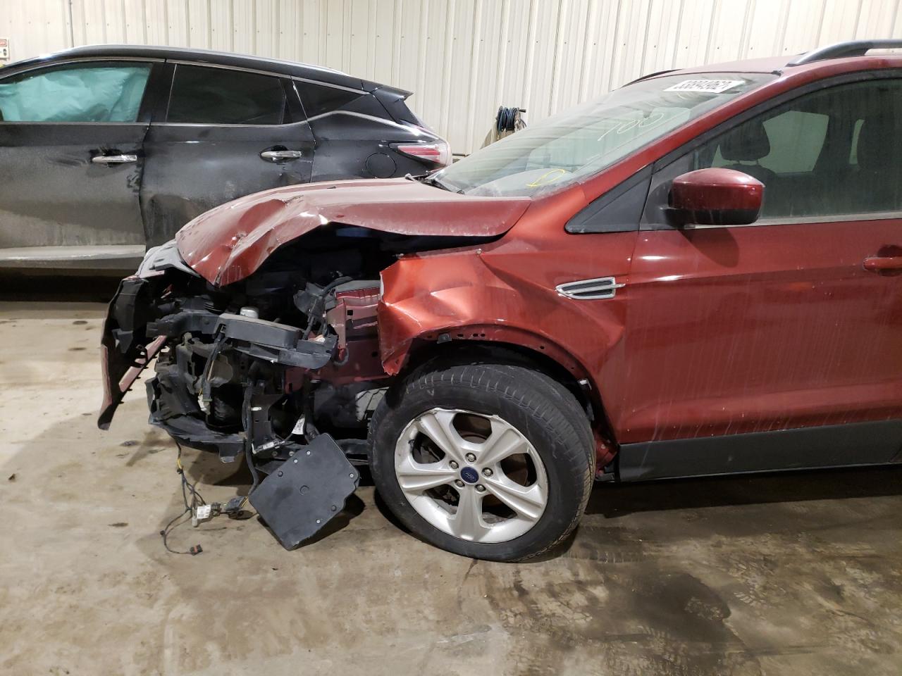 Photo 9 from auction – 2015 FORD ESCAPE SE with VIN 1FMCU9G94FUC30227