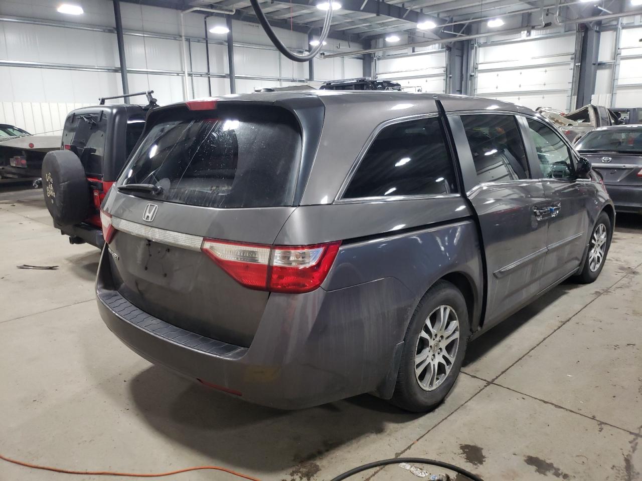 Photo 4 from auction – 2011 HONDA ODYSSEY EX with VIN 5FNRL5H68BB067289