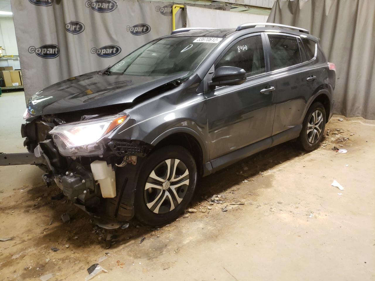 Photo 2 from auction – 2017 TOYOTA RAV4 LE with VIN JTMZFREV3HJ708263