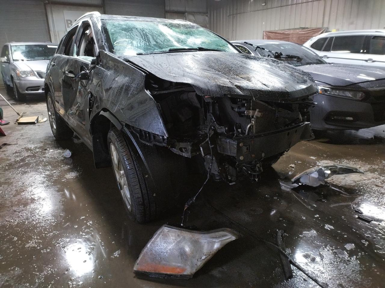 CADILLAC SRX PERFOR 2012 with VIN 3GYFNEE34CS510158 - Photo from auction