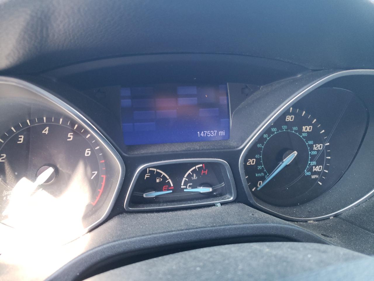 Photo 8 from auction – 2013 FORD FOCUS SE with VIN 1FADP3F24DL205032