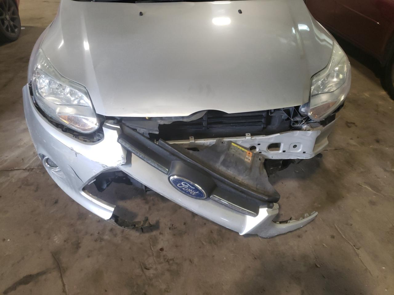 Photo 9 from auction – 2012 FORD FOCUS SE with VIN 1FAHP3F2XCL163854