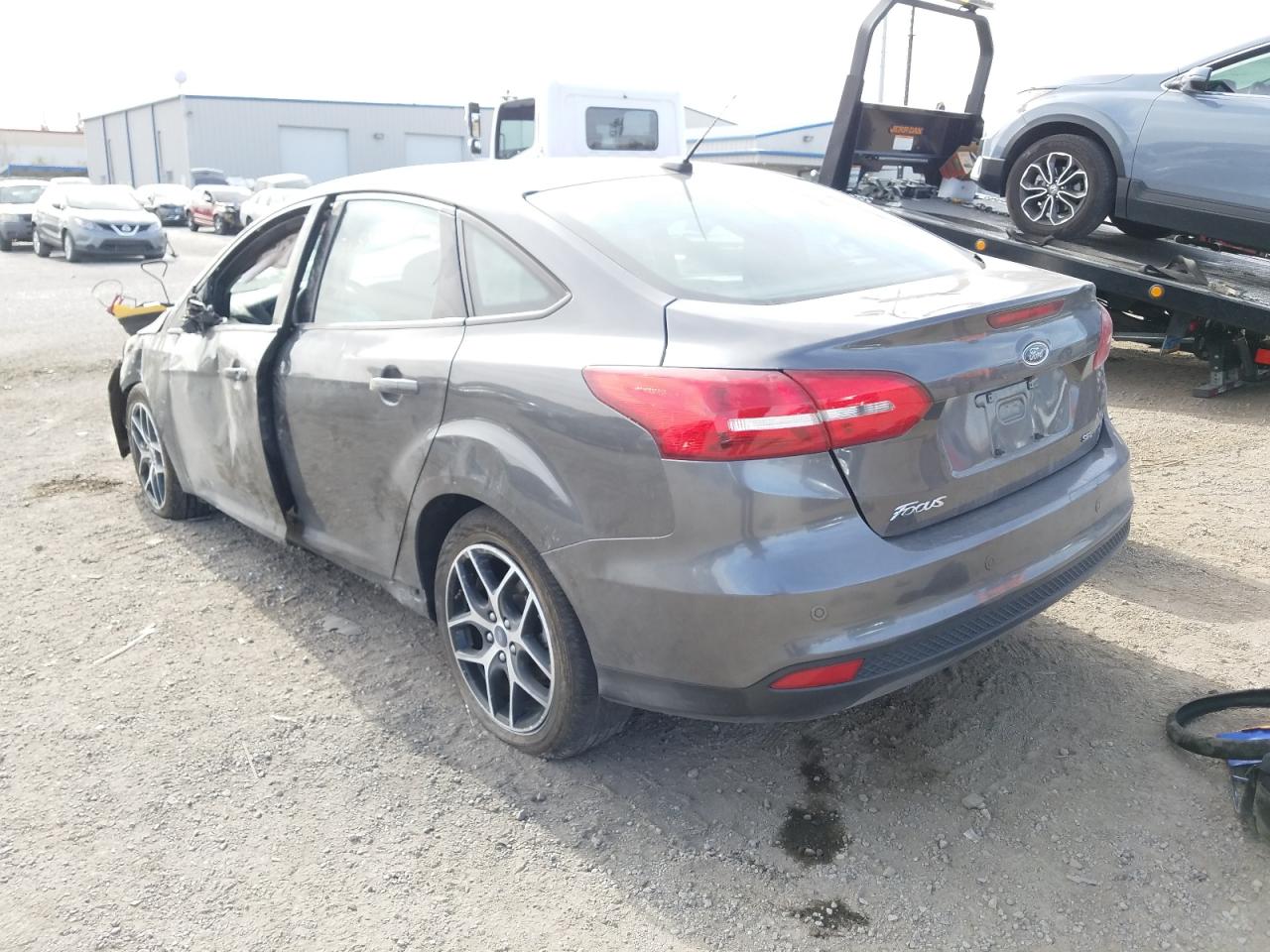 Photo 3 from auction – 2018 FORD FOCUS SEL with VIN 1FADP3H27JL313072