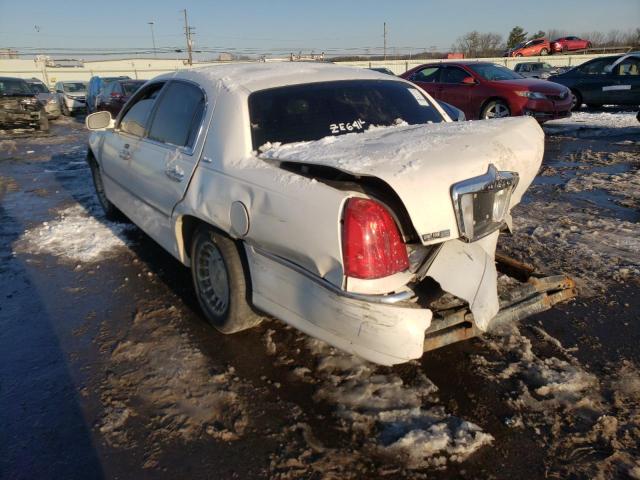 Photo 3 from auction – 1999 LINCOLN TOWN CAR E with VIN 1LNHM81W2XY667863