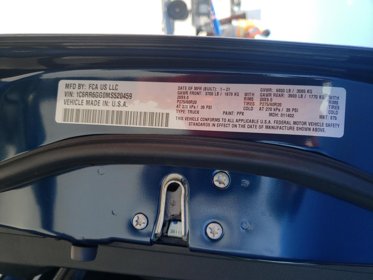 Photo 10 from auction – 2021 RAM 1500 CLASS with VIN 1C6RR6GG0MS520459
