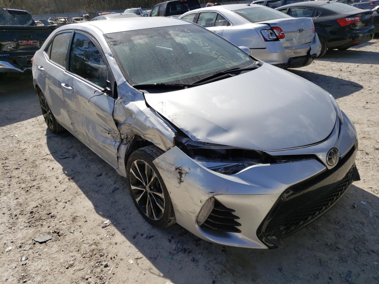 TOYOTA COROLLA L 2017 with VIN 5YFBURHE6HP689450 - Photo from auction