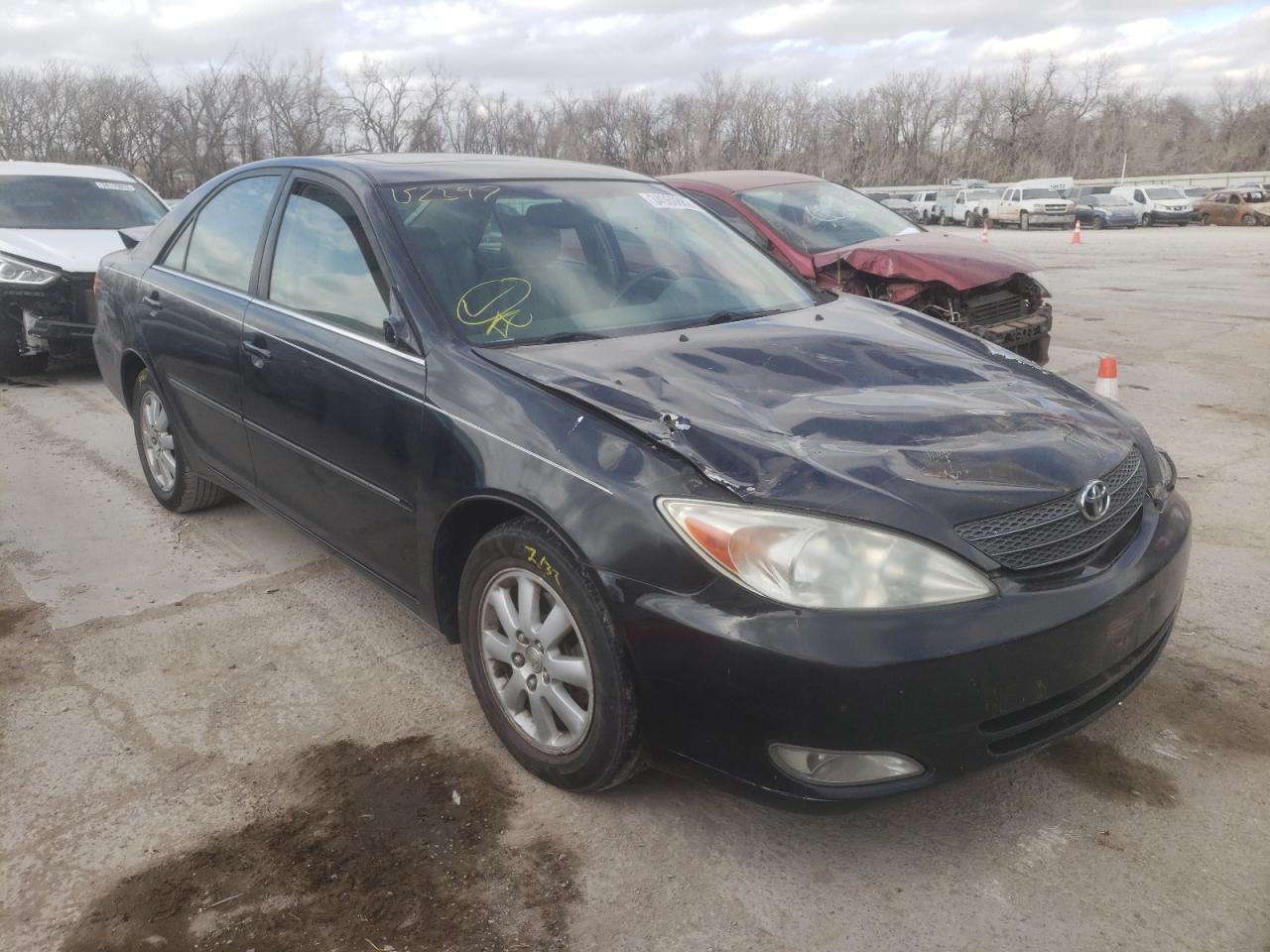 TOYOTA CAMRY LE 2004 with VIN JTDBF30K540152596 - Photo from auction